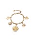 Bracciale in acciaio dorato con Soli e Stelle