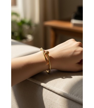 Bracciale in acciaio "Chiodo" dorato con strass