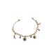 Bracciale in acciaio dorato con sole e mezzelune