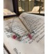 Bracciale in acciaio colore argento con charms