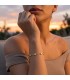Bracciale in acciaio colore oro con cubic zirconia trasparenti