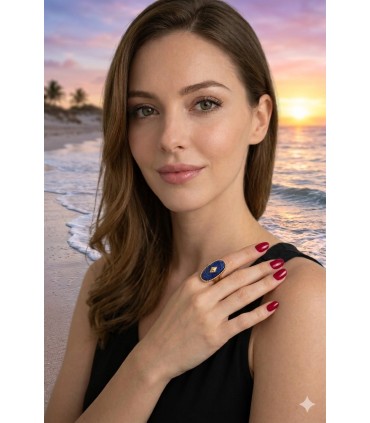 Anello in acciaio dorato ovale con sodalite